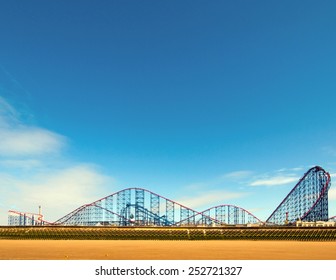 Roller Coaster And Blackpool Beach