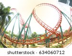 Roller coaster loop and sunny