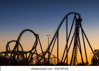 Roller Coaster Silhouette At Sunset