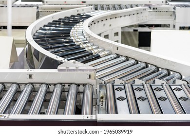 roller conveyor of automatic production line of manufacturing process for transportation material goods or product etc. in industrial - Shutterstock ID 1965039919