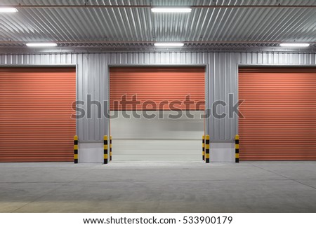 Roller door or roller shutter. Also called security door. Motorized type or automatic system. For safety or protect commercial and industrial building i.e. warehouse, factory, hangar shop and store.