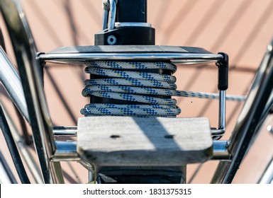 Roller Furling On The Bow Of A Sailboat To Control The Jib Sail From The Cockpit Of The Vessel. Close Up.