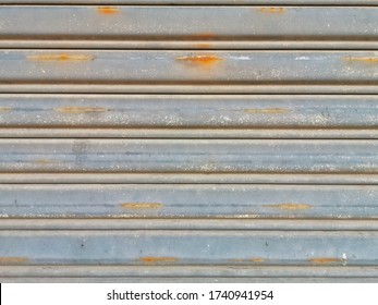 Roller Shutter Door Or Rolling Steel Door Old Rusted Up.