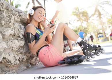 Roller Skater Listening To Music With Headphones