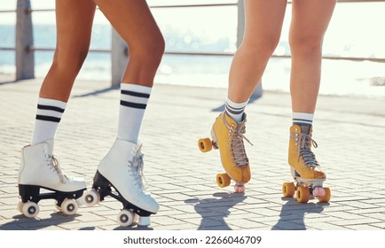 Roller skates or fun friends on promenade for summer holiday activity or travel outdoor. Cool, trendy or funky women skating legs in quad skating or rollerblades with sunshine, beach and ground - Powered by Shutterstock
