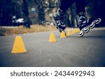 Roller skating slalom around yellow cones close-up. Roller Slalom element- Heel Toe