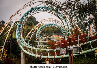 Rollercoaster At Abandoned Theme Park Nara Dreamland With Autumn Leaves