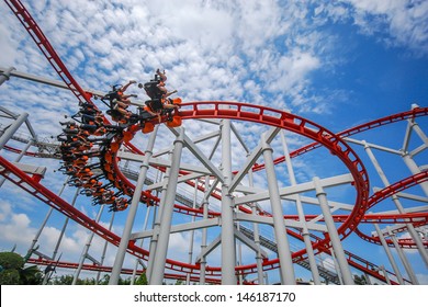 Rollercoaster Against Blue Sky