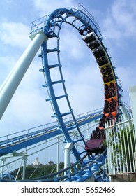 Rollercoaster & cloudy blue sky