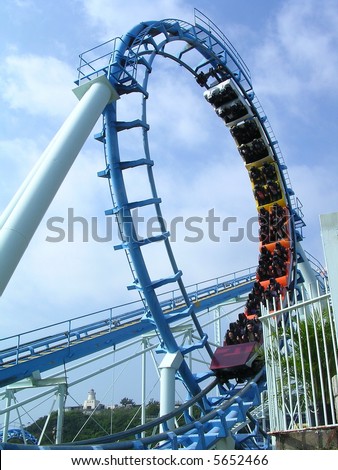 Rollercoaster & cloudy blue sky