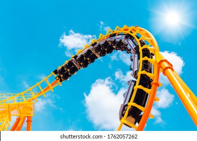 Rollercoaster railroad car no people testing track high to the sky roll bend and twist for exciting fun people at theme park during Coronavirus(Covid-19) pandemic