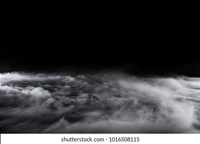 Rolling billows of swirling clouds from dry ice across the bottom even light - Shutterstock ID 1016508115