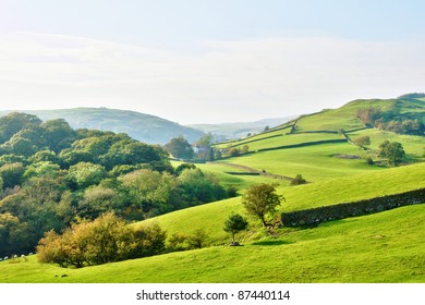 Rolling countryside around a farm - Shutterstock ID 87440114