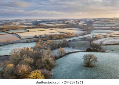 Rolling countryside at dawn on a frosty winter morning, Devon, England, United Kingdom, Europe - Powered by Shutterstock