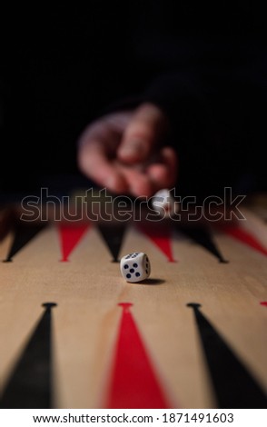 Rolling dices in a dark environment