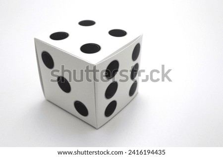 Rolling dices on white gambling casino poker table background backdrop