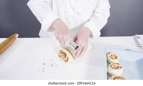 Rolling Dough With A French Rolling Pin To Bake Cinnamon Rolls.