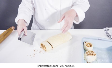 Rolling Dough With A French Rolling Pin To Bake Cinnamon Rolls.