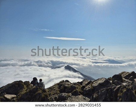 rolling mountain top cloud inversion 