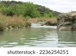 Rolling Rapids with Rocks and Trees