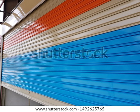 Similar – Image, Stock Photo The roller shutter has been closed for a long time, tender tendrils conquer it as a climbing aid