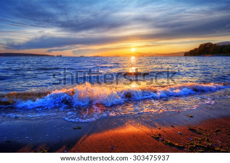 Rolling waves along the shore