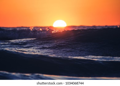 Rolling Waves at Sunset