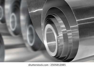 rolls of aluminum metal material with blur background. selective focus