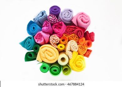 Rolls Of Colored Fabric On A White Background. White Background. View From Above.