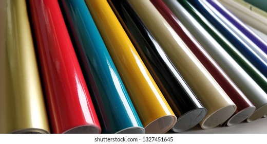 Rolls of colored vinyl film isolated