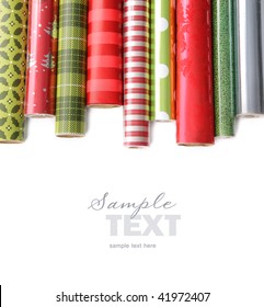 Rolls Of Colored Wrapping  Paper On White Background