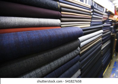 Rolls Of Fabric And Textiles In A Factory Shop