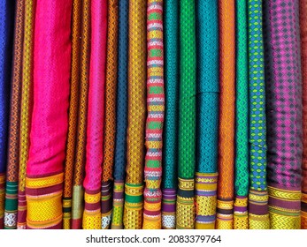 Rolls Of Fabric And Textiles In Shop. Multi Colors Indian Patterns On The Market Fabrics In Rolls. Fabric Store In Pune, Maharashtra, India.