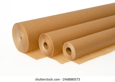 A rolls of folded brown silicone parchment baking paper