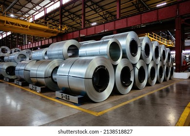 Rolls of galvanized steel sheet inside the factory or warehouse. - Shutterstock ID 2138518827