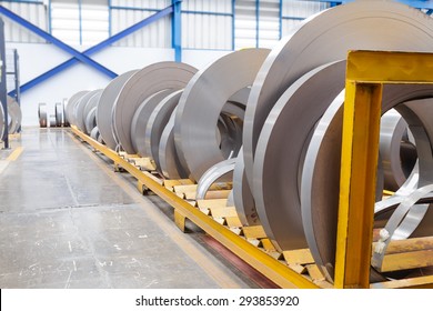 Rolls of metal sheet waiting for assembly in factory