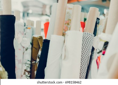 Rolls Of Natural High Fashion Fabrics And Textiles. Sewing Industry Concept