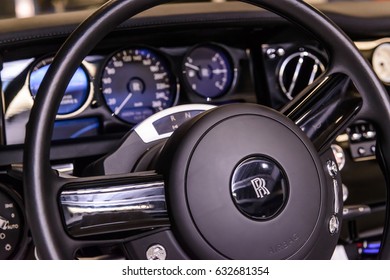 Rolls Royce Coupe steer wheel. MOSCOW, RUSSIA - MARCH 27, 2017: Parked car in the center of city open by owner   - Shutterstock ID 632681354