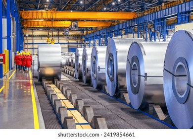 Rolls of sheet steel in selective focus. Cold rolled and hot rolled steel products for sale.Billboard, copy space.
