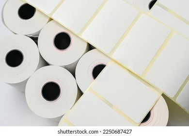 Rolls of white labels isolated. Labels for direct thermal or thermal transfer printing. Blank sticky label roll for thermal transfer printing pirce criss the brand for labels, labelers self-adhesiv
 - Shutterstock ID 2250687427