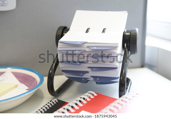 Rolodex rotary card address and telephone\
contact desk organiser. Business card\
holder