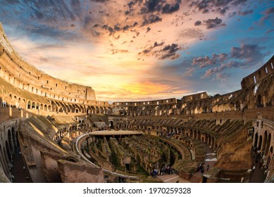 Roma, Italy - 05.10.2017: The Colosseum  - Colosseo - where the gladiators fought, one of the most famous monuments and buildings and sights of ancient Rome. Interior of the Colosseum at sunset
