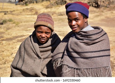 Roma, Kingdom of Lesotho, Africa – 26th of July 2019: shepherds from Basotho people, traditionally dressed with tribal blankets.
