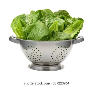 Romain Lettuce In A Stainless Steel Colander. The Produce Is Wet From A Fresh Washing. The Image Is A Cut Out, Isolated On A White Background.