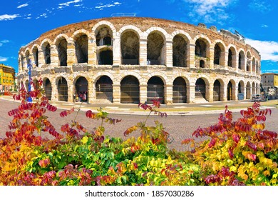 Roman amphitheatre Arena di Verona and Piazza Bra square autumn leaves view, landmark in Veneto region of Italy