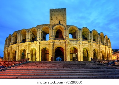 Roman amphitheatre in Arles, France, illuminated at late evening