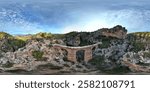 The Roman Aqueduct of Pena Cortada located near Valencia, Spain is a colossal work of hydraulic engineering built in the 1st century AD.