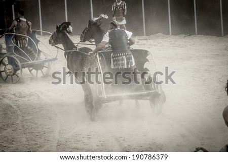 Roman chariot in a fight of gladiators, bloody circus