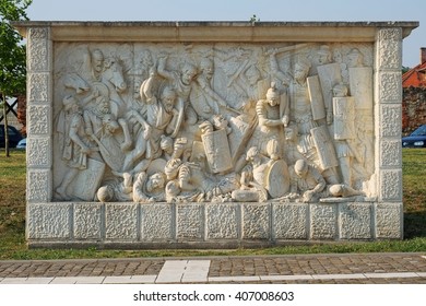 Roman And Dacian War Fight Scene On A Relief In Carolina Citadel In Alba Iulia, Romania