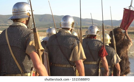 A Roman Legion Was A Large Military Unit Of The Roman Army. Ancient Roman Military Clothing. The Roman Legions Marching To A Historical Battle